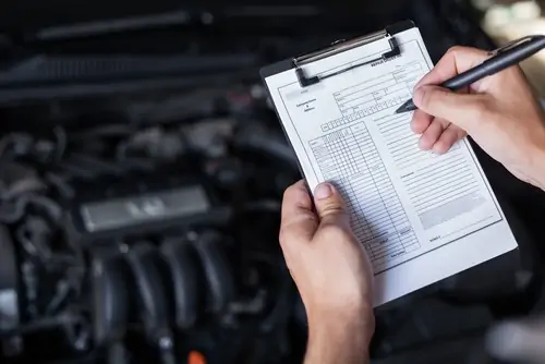 A workshop preparing a vehicle for LTA inspection